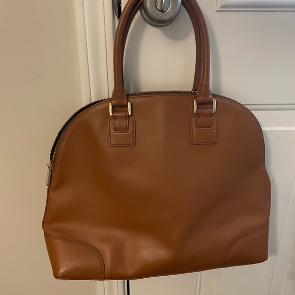 Great Tory dome bag. Inside has stain but outside looks great. - Picture 2 of 3